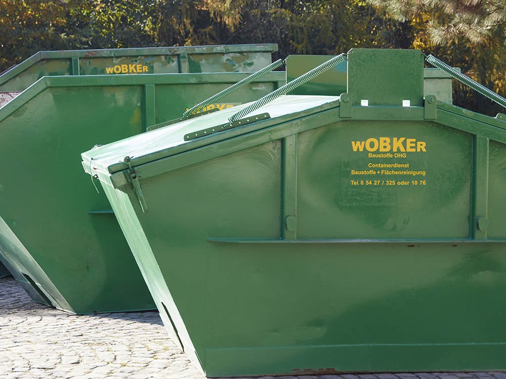 Geschlossene Absetzmulde für Bauschutt und Grünabfall – Containerdienst Melle Geschlossene grüne Container-Mulde für Entsorgung von Bauschutt und Grünabfall in Melle